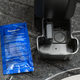 The Arc6's charging dock opened to reveal a compartment for cleaning solution.